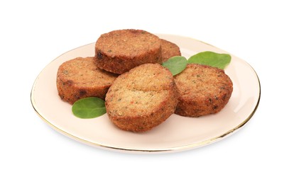 Photo of Plate of delicious vegan cutlets and spinach isolated on white