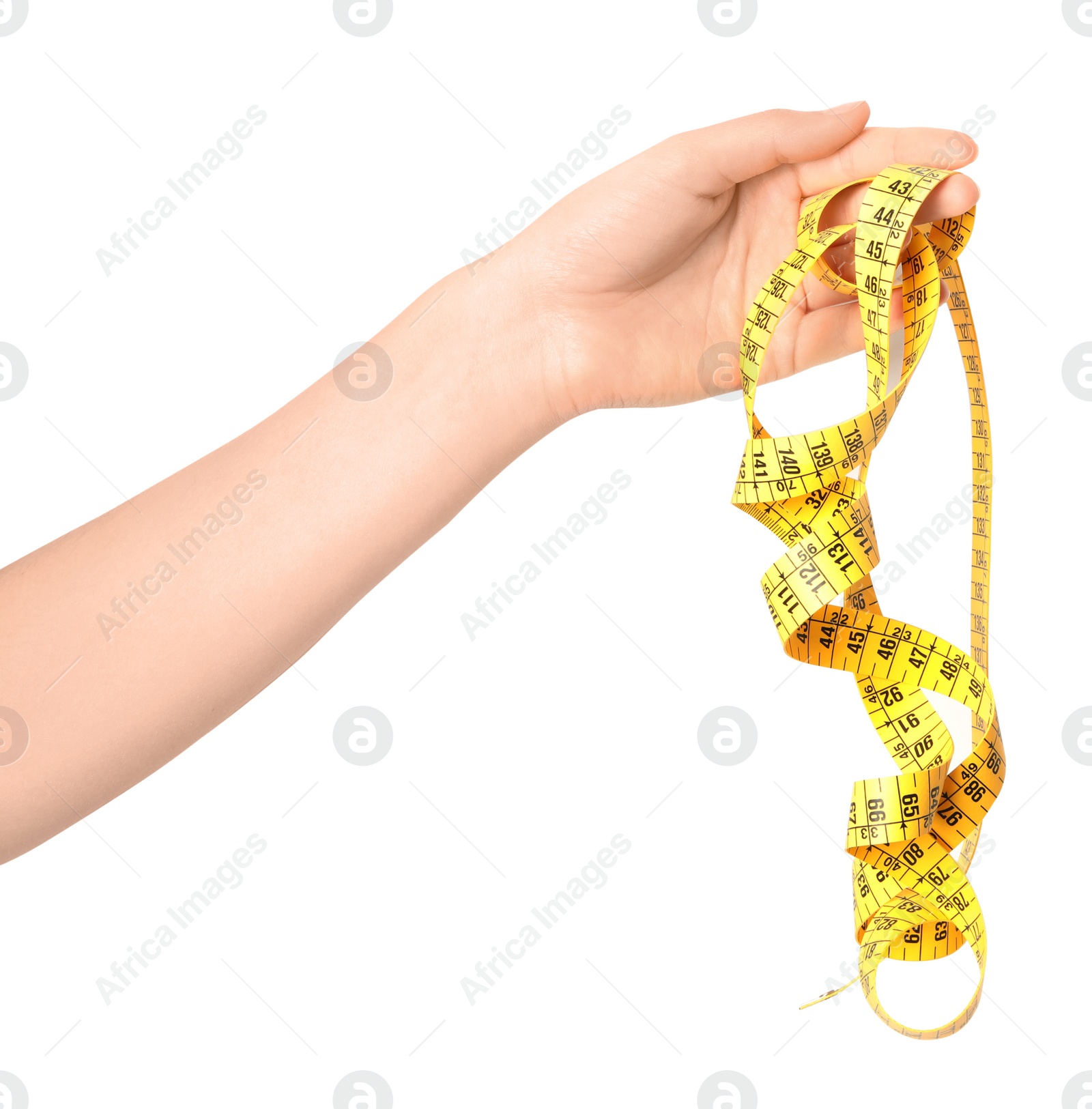 Photo of Woman holding yellow measuring tape on white background, closeup