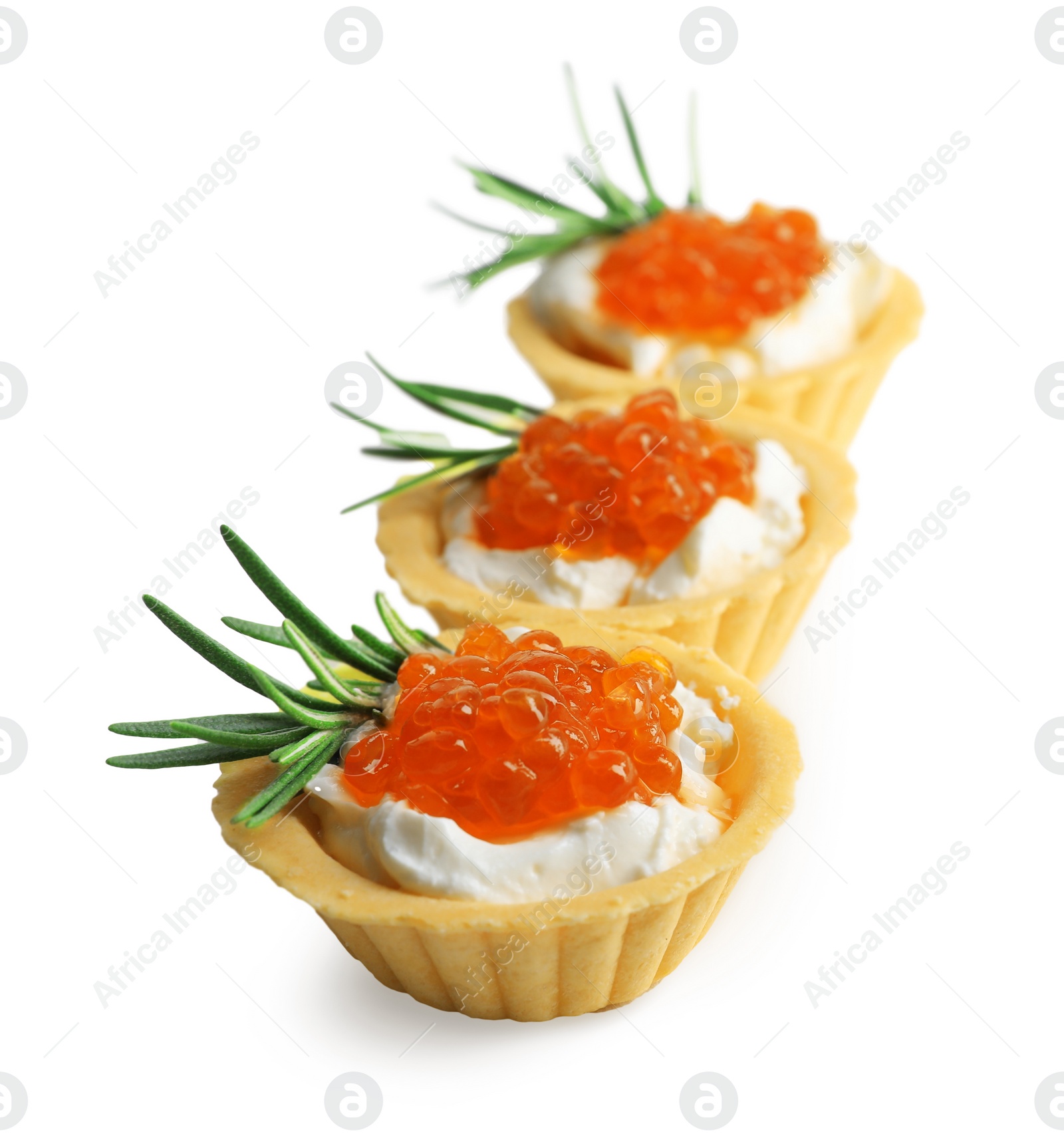 Photo of Delicious tartlets with red caviar and cream cheese on white background