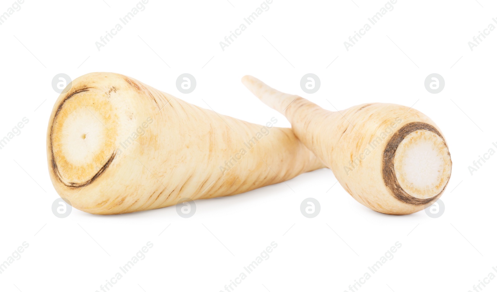 Photo of Tasty fresh ripe parsnips on white background