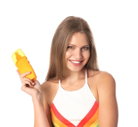 Woman with bottle of sun protection body cream on white background