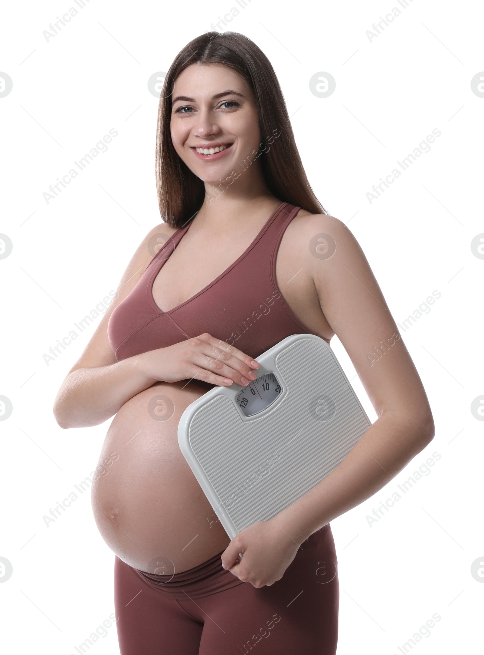 Photo of Pregnant woman with scales on white background