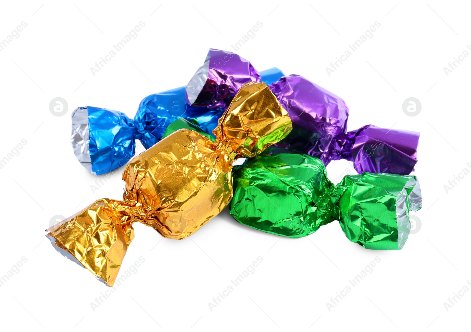 Photo of Tasty candies in colorful wrappers isolated on white