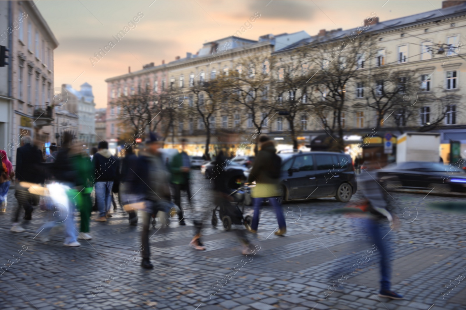 Photo of People crossing city street, long exposure effect