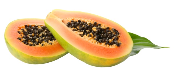 Photo of Fresh halved papaya fruit with green leaf on white background