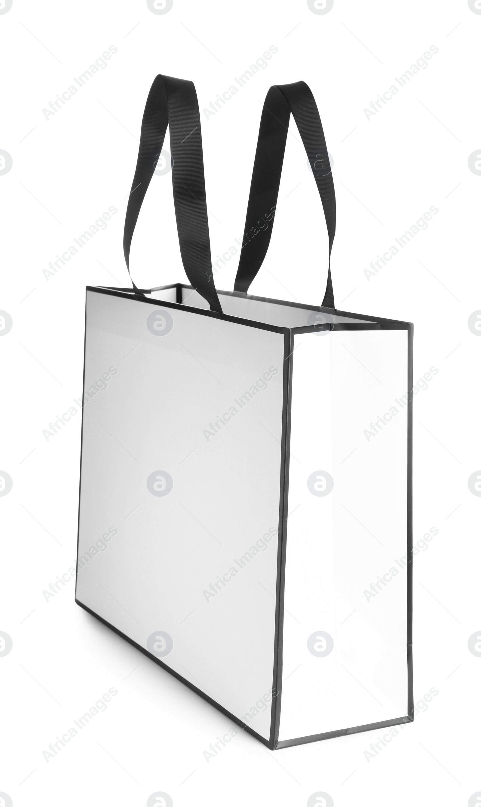 Photo of One paper bag isolated on white. Mockup for design