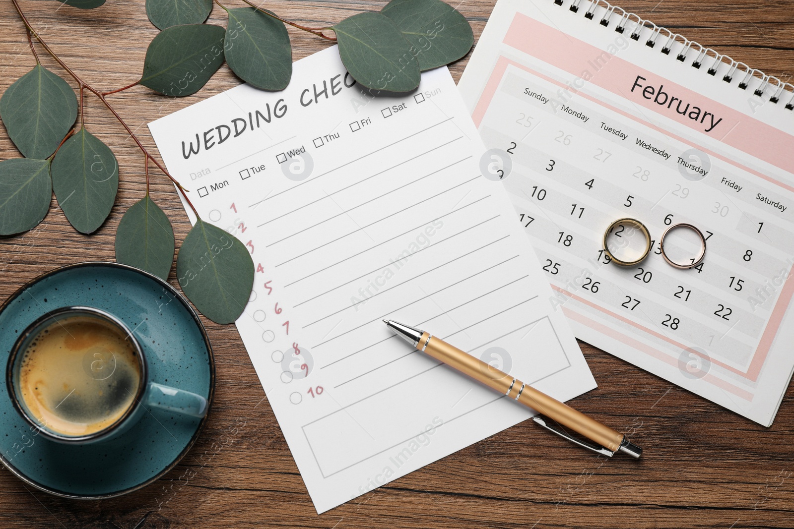 Photo of Flat lay composition with Wedding Checklist and calendar on wooden table