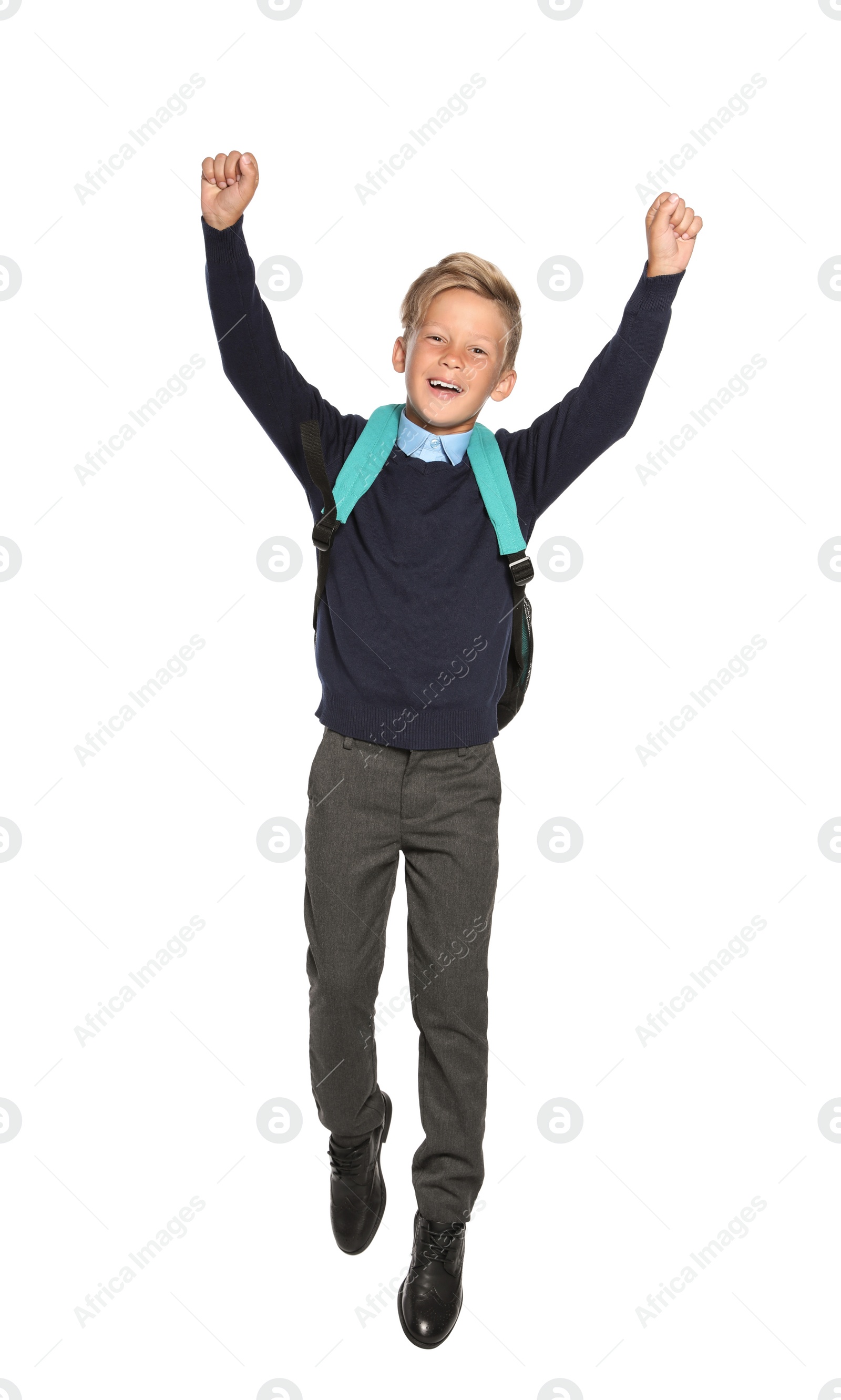 Photo of Little boy in stylish school uniform on white background