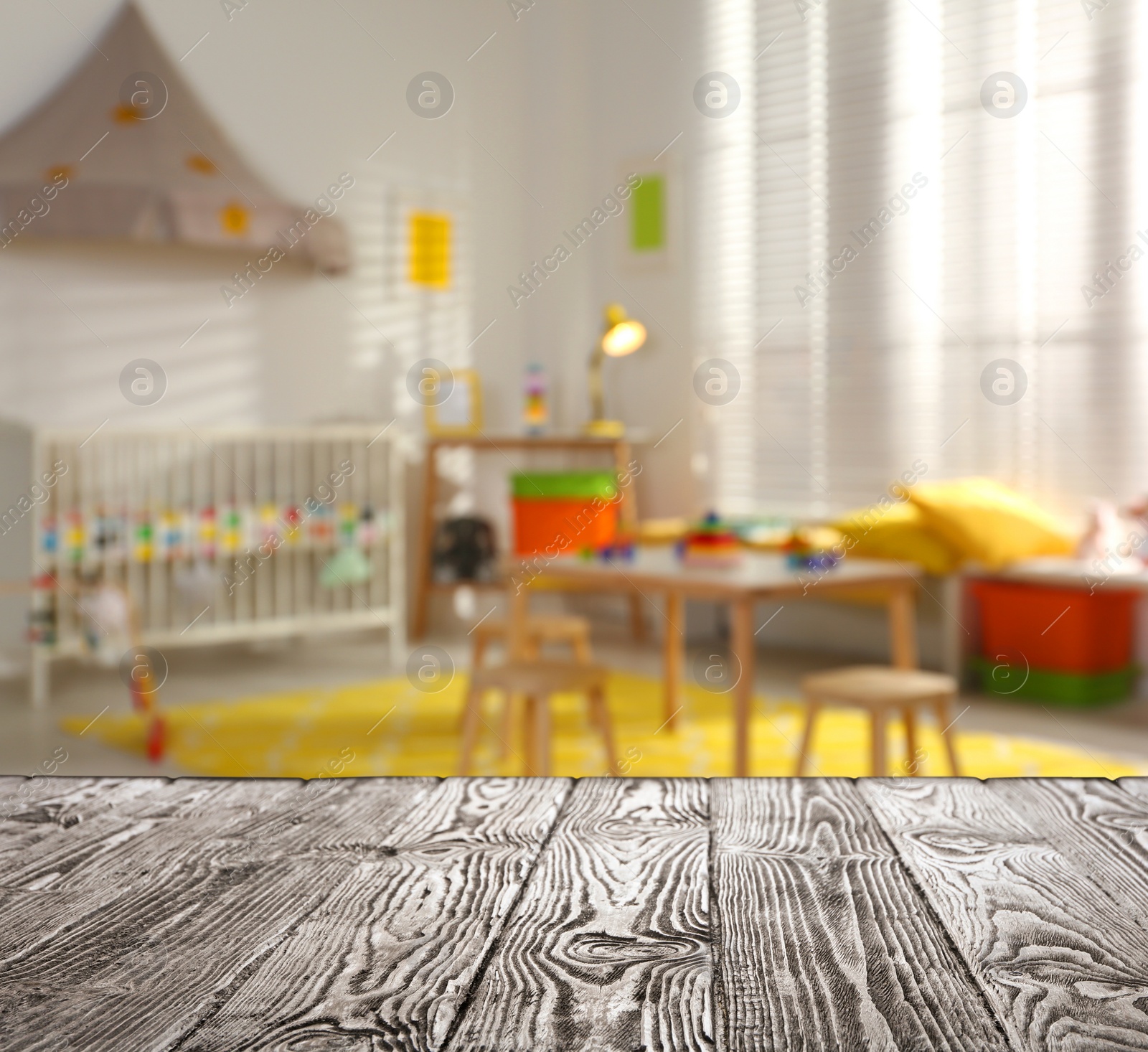 Image of Empty wooden table in baby room interior