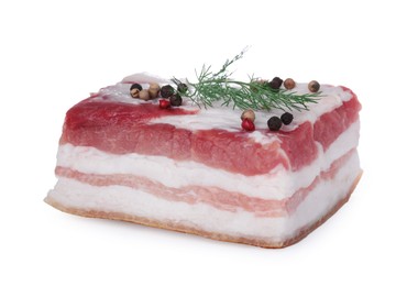 Photo of Piece of pork fatback with dill and spices isolated on white