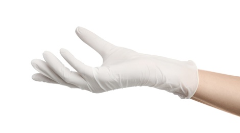 Doctor wearing medical gloves on white background, closeup