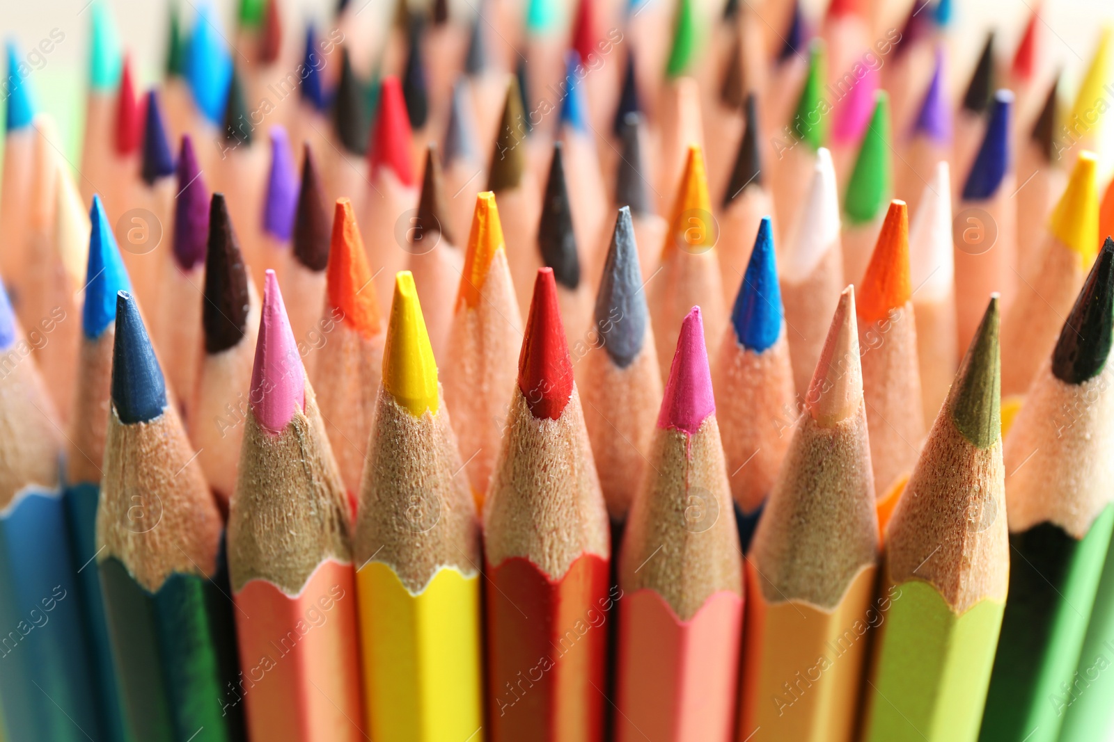 Photo of Different color pencils as background, closeup view