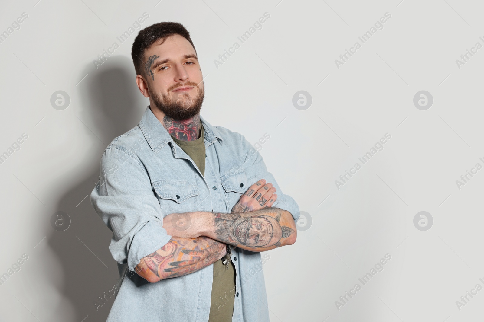 Photo of Portrait of hipster man on light grey background. Space for text