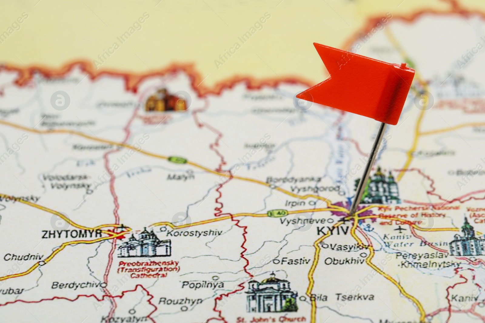 Photo of MYKOLAIV, UKRAINE - NOVEMBER 09, 2020: Kyiv city marked with push pin on map of Ukraine, closeup