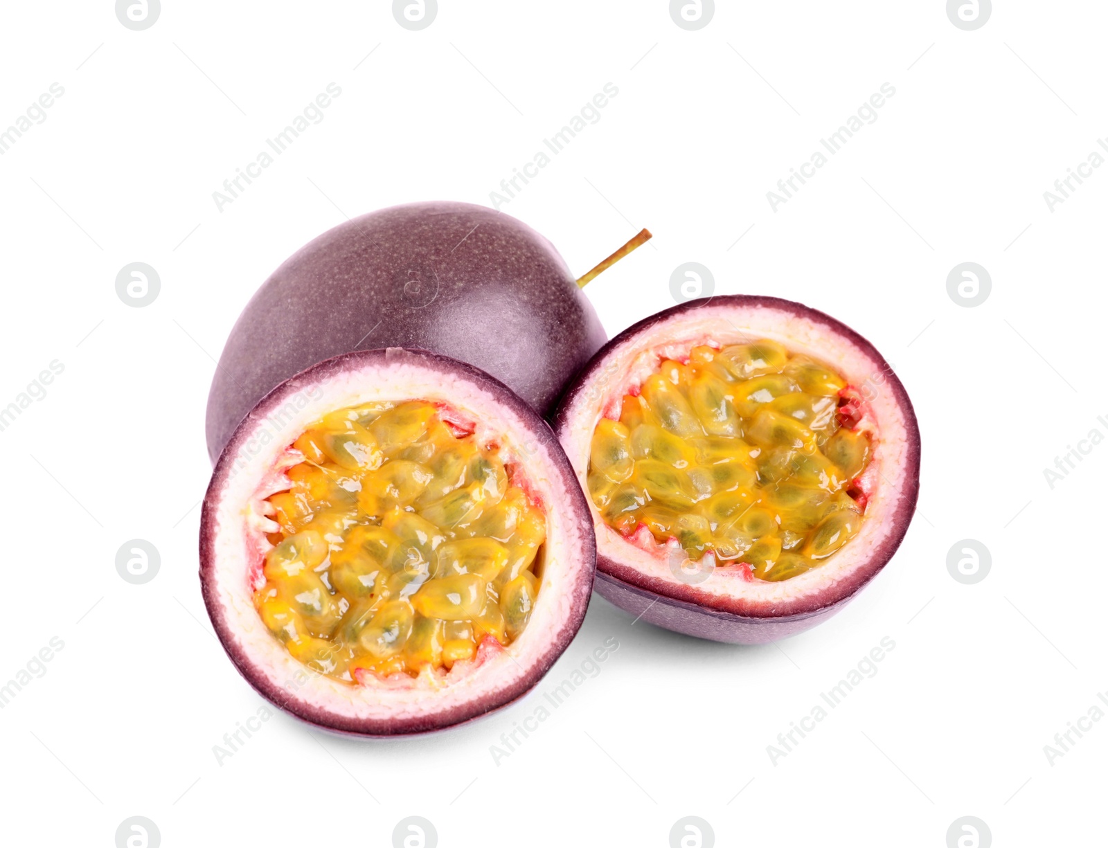 Photo of Cut and whole passion fruits on white background