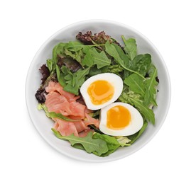 Photo of Delicious salad with boiled egg, salmon and arugula in bowl isolated on white, top view
