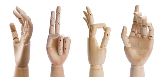 Image of Set with wooden hands of mannequins showing different gestures on white background. Banner design