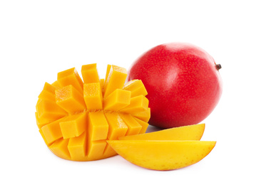 Whole and cut ripe mangoes isolated on white. Exotic fruit