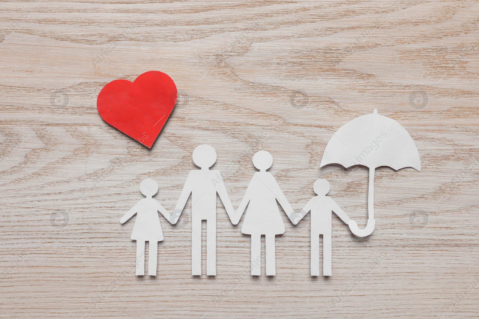 Photo of Paper family cutout and red heart on white wooden table, flat lay. Insurance concept