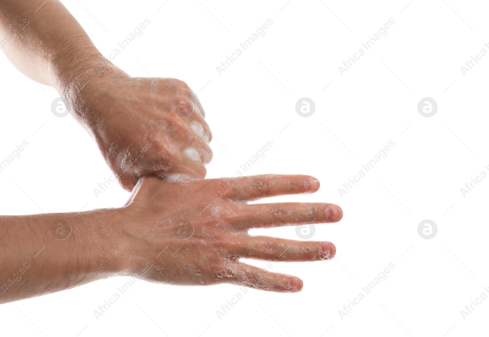 Photo of Man washing hands with soap on white background, closeup