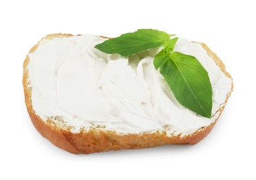 Photo of Bread with cream cheese and basil leaves isolated on white