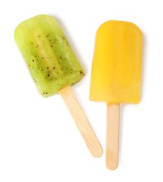 Photo of Delicious ice pops on white background, top view. Fruit popsicle
