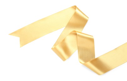 Photo of Beautiful golden ribbon isolated on white, top view