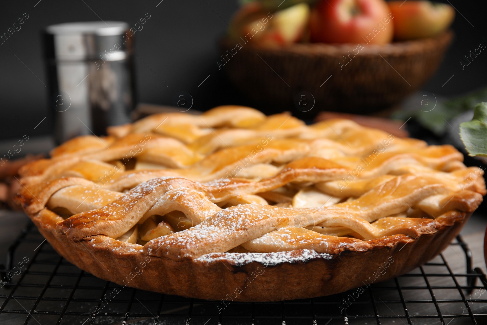 Photo of Delicious traditional apple pie on table, closeup