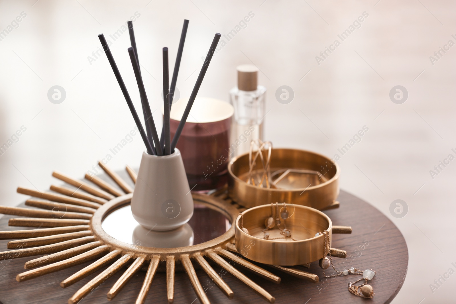 Photo of Composition with stylish accessories and interior elements on table indoors