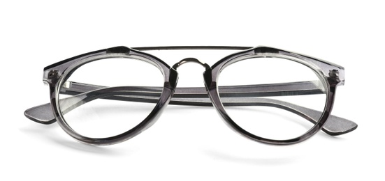 Photo of Glasses with corrective lenses on white background. Vision problem