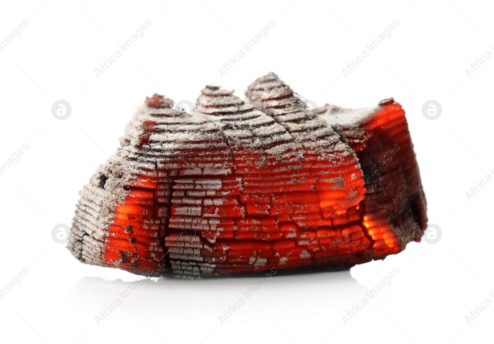 Photo of Piece of smoldering coal on white background