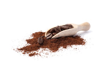 Photo of Heap of ground coffee and wooden scoop with beans on white background