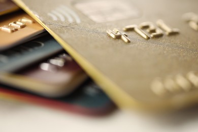 Plastic credit cards on table, macro view