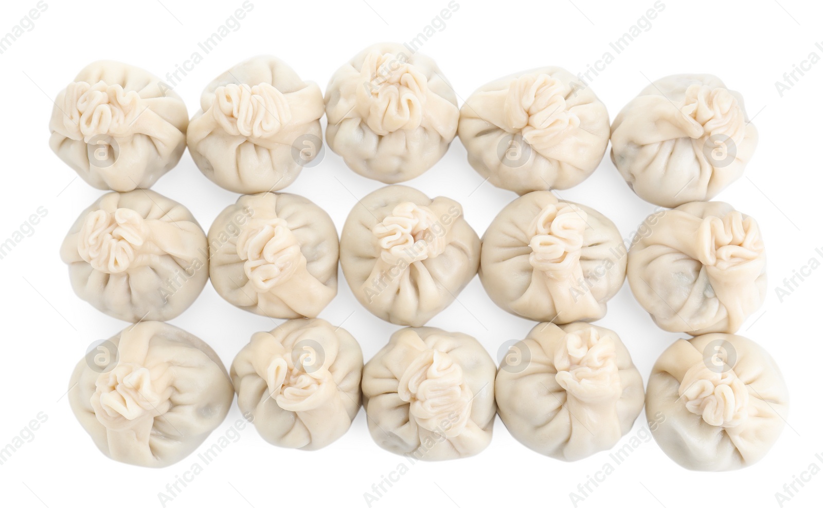 Photo of Many tasty khinkali (dumplings) isolated on white, top view. Georgian cuisine