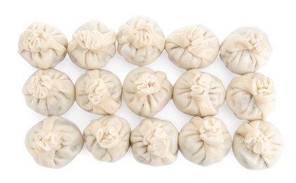 Many tasty khinkali (dumplings) isolated on white, top view. Georgian cuisine