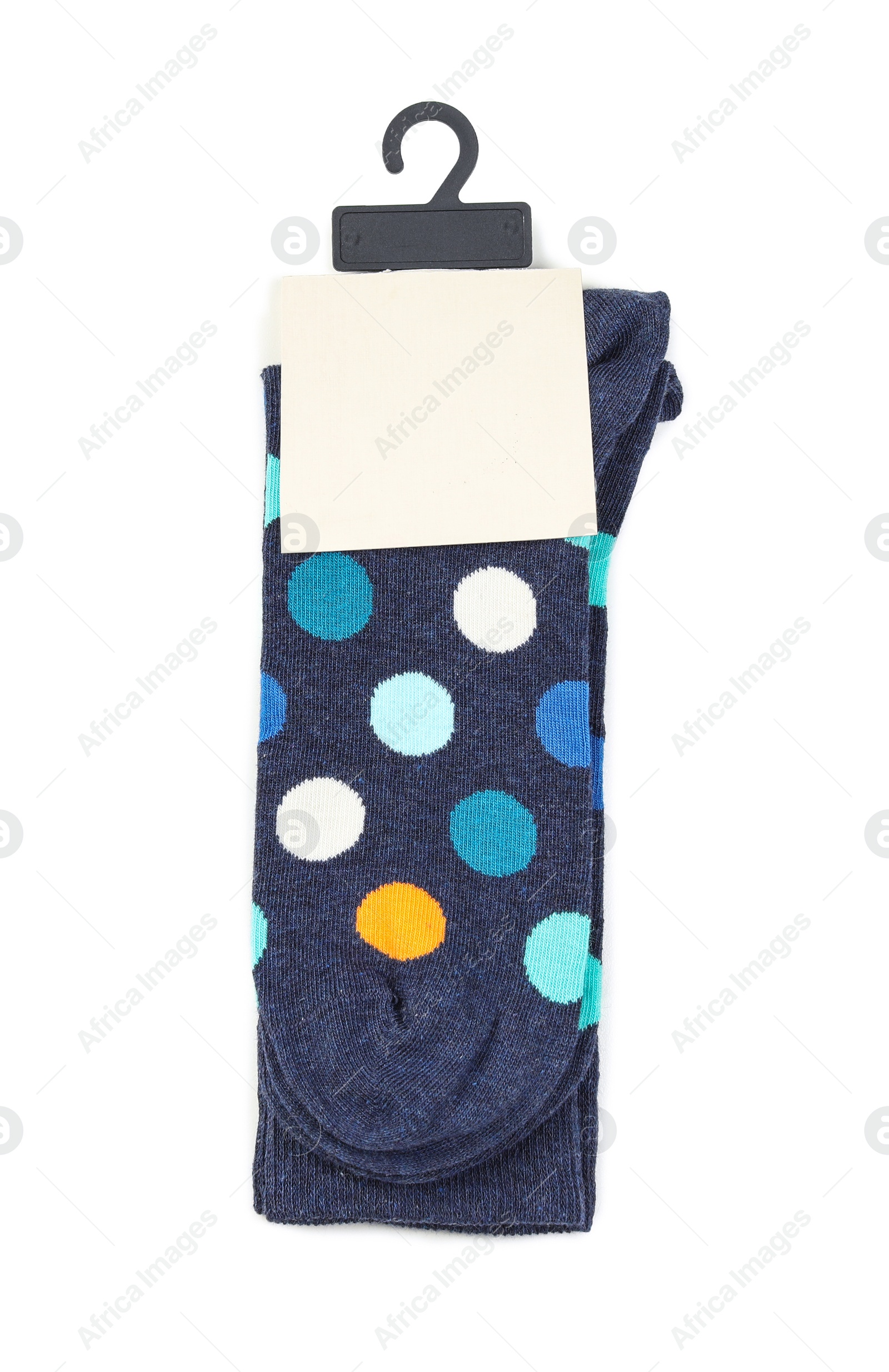 Photo of Colorful socks on white background, top view