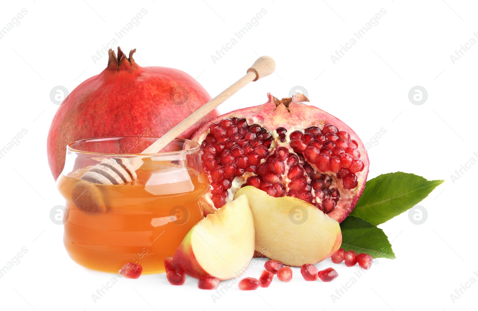 Photo of Honey, apples and pomegranate on white background. Rosh Hashanah holiday