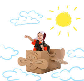 Cute little child playing in cardboard airplane on white background with illustrations
