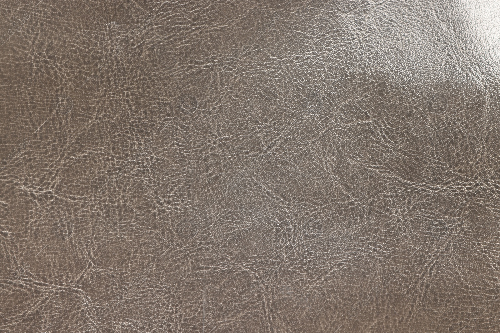 Photo of Natural leather with wrinkles as background, top view