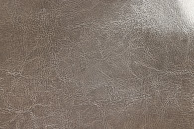 Photo of Natural leather with wrinkles as background, top view