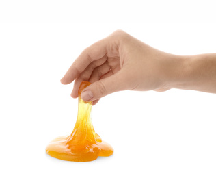 Photo of Woman playing with orange slime isolated on white, closeup. Antistress toy