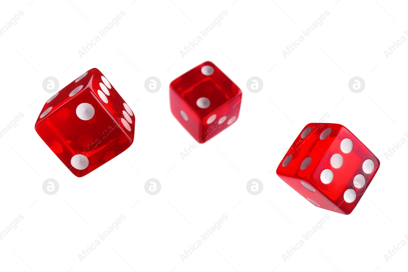 Image of Three red dice in air on white background