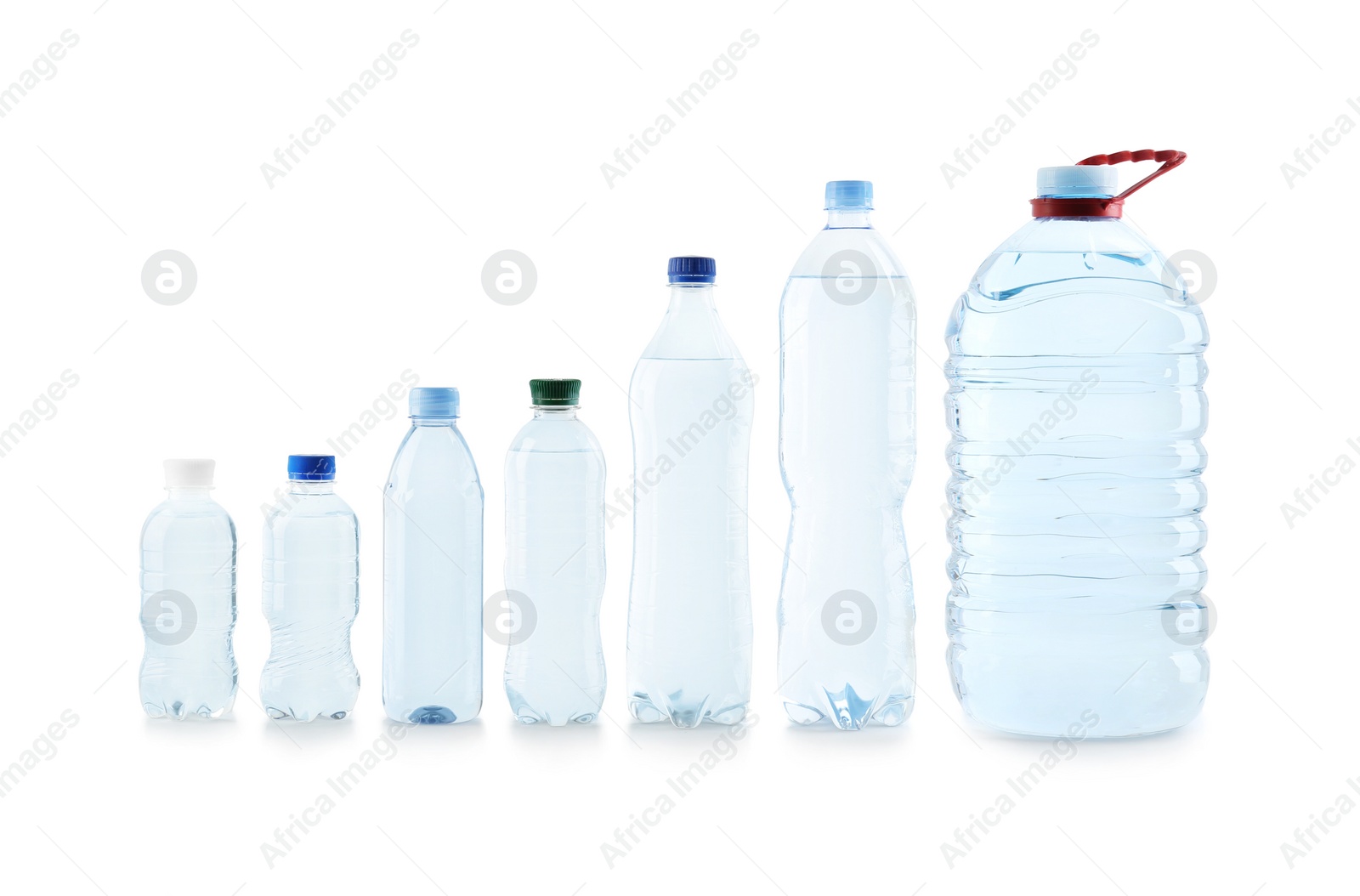 Photo of Set of different plastic bottles with pure water on white background