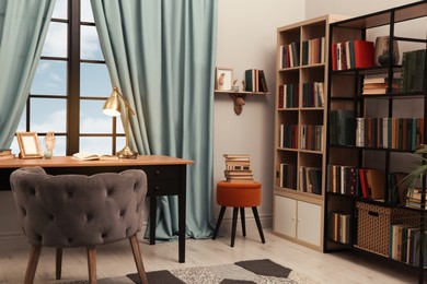 Photo of Cozy home library interior with collection of different books on shelves