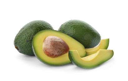 Photo of Ripe avocados on white background. Tropical fruit