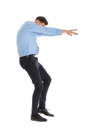 Man in office wear posing on white background