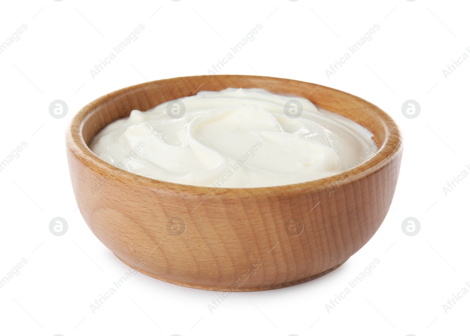 Photo of Bowl with sour cream on white background