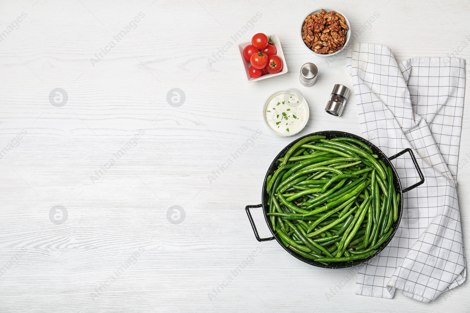 Photo of Flat lay composition with tasty green beans on wooden table