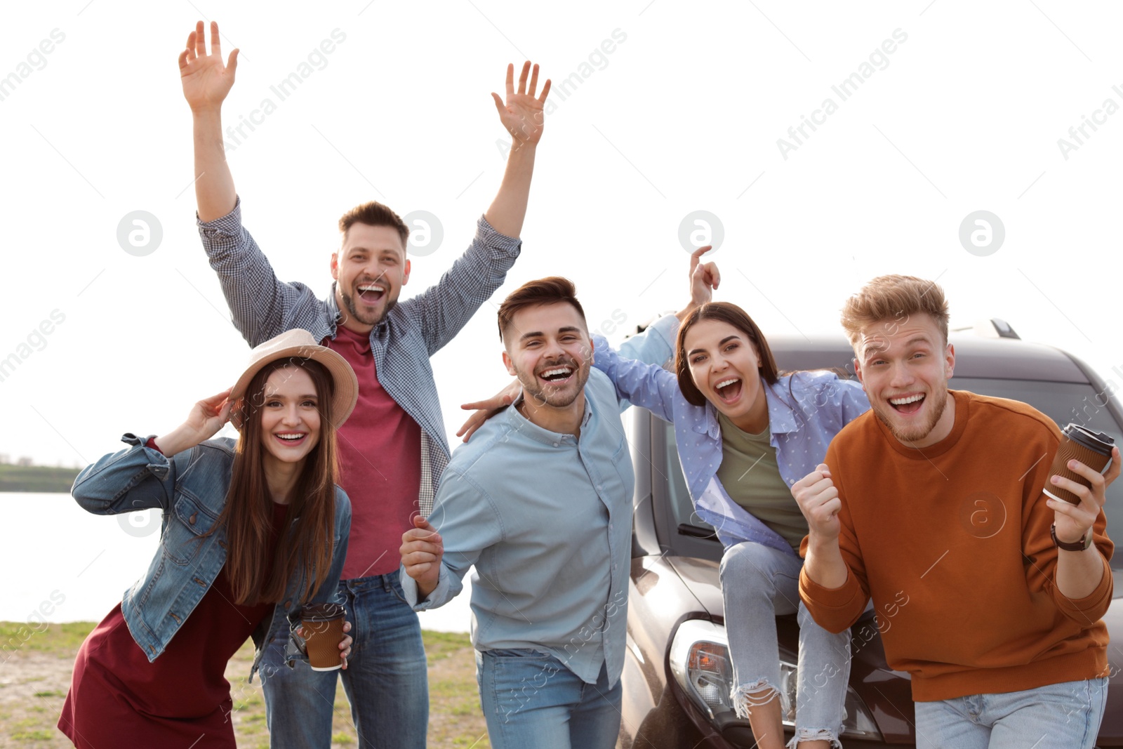 Photo of Group of happy people spending time together outdoors