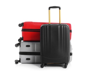 Photo of Modern suitcases for travelling on white background